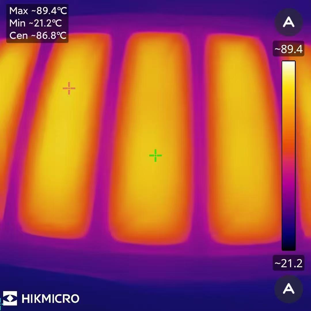 Thermal imaging verification of a graphene heating panel — uniform temperature distribution is a key driver of livestock heating energy efficiency