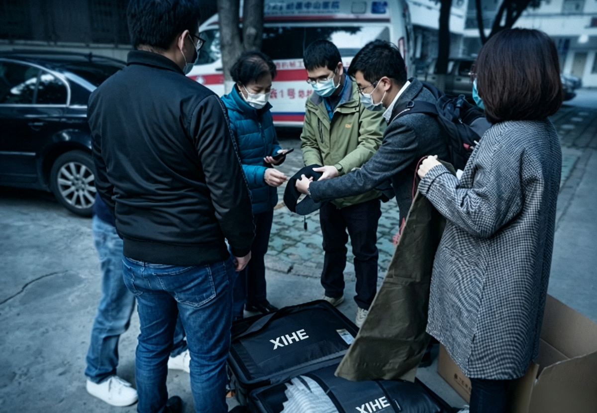 XIHE team during a documented hospital product cooperation activity